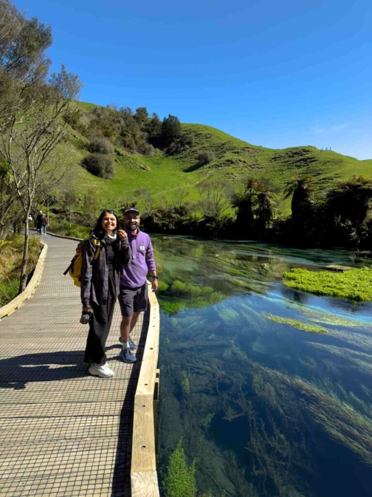 Crystal clear turquoise water flowing through Blue Spring Te Waihou Walkway near Rotorua New Zealand