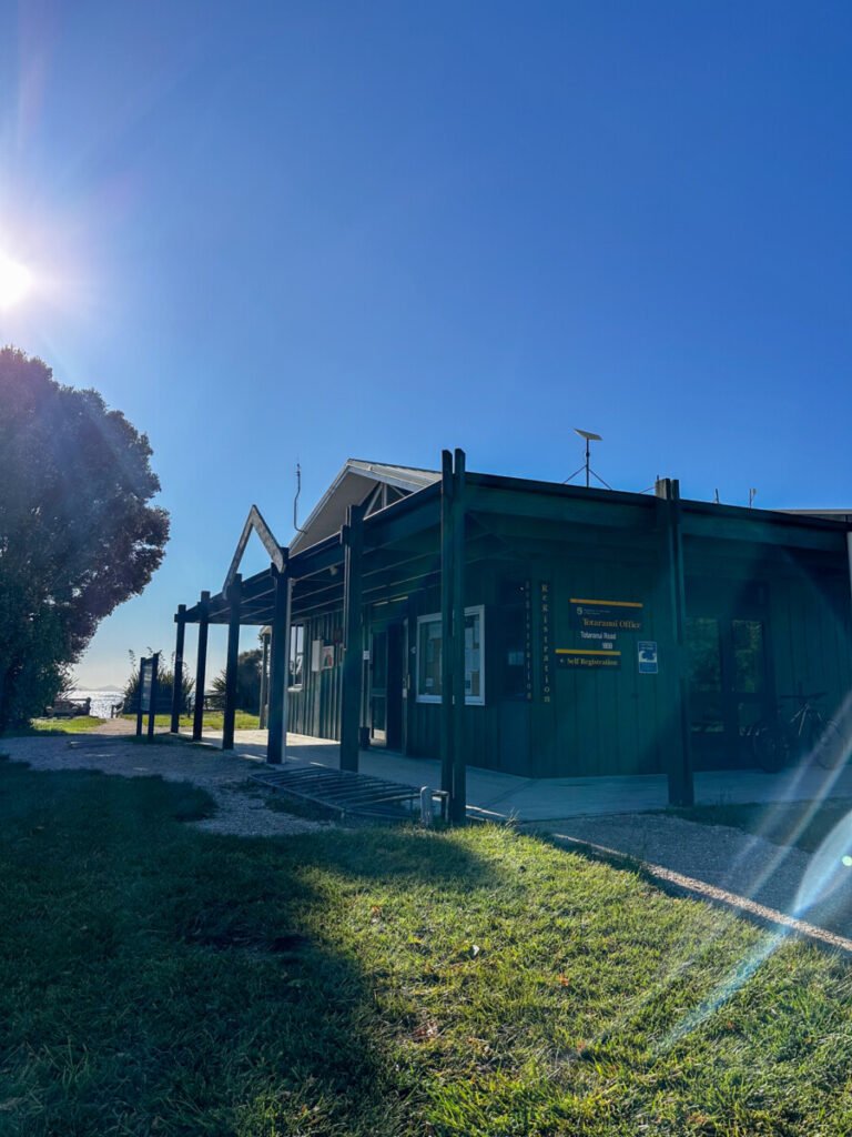 Totaranui Campground self-registration office building at the DOC campsite near Totaranui Beach in Abel Tasman New Zealand