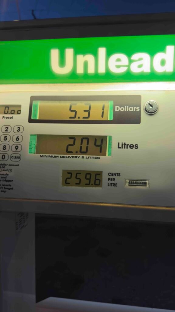 Close-up of a New Zealand petrol station pump showing unleaded fuel at 259.6 cents per litre