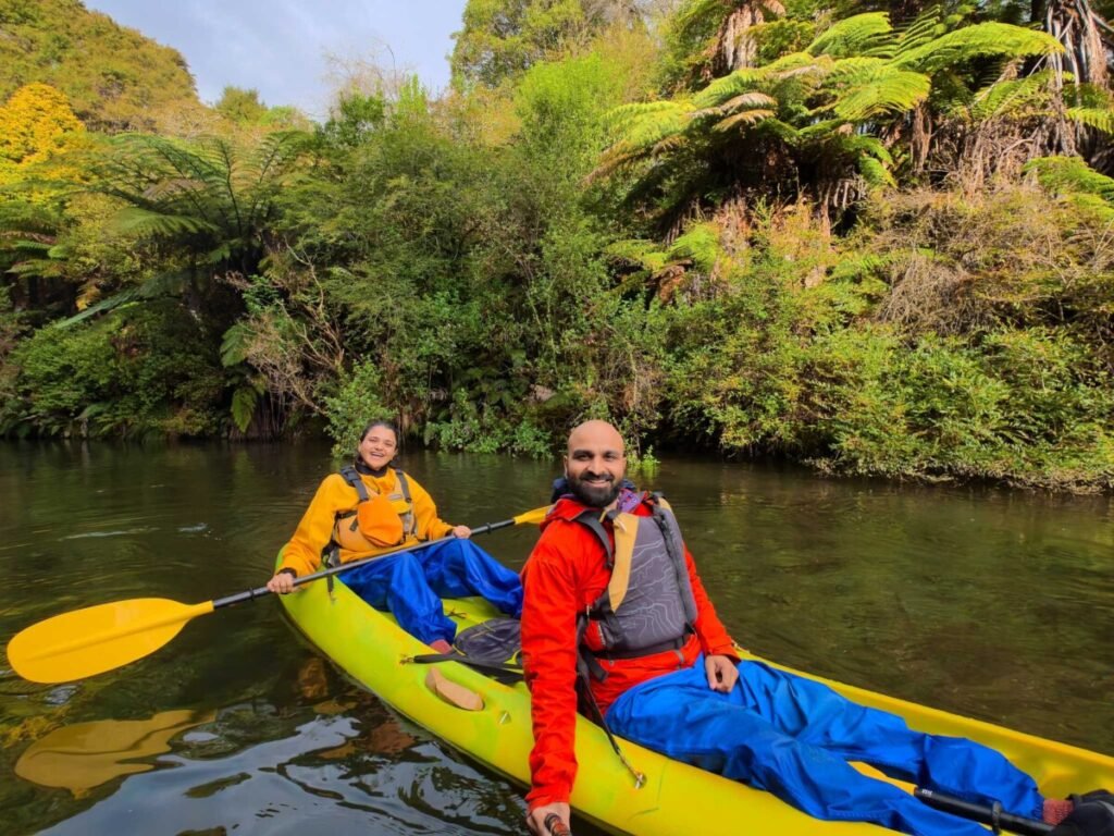 Guided kayaking through dramatic canyon scenery on a Riverside Adventures tour near Rotorua New Zealand