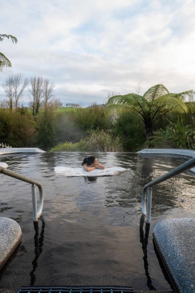 Soaking in the geothermally heated pools at Waikite Valley thermal pools near Rotorua New Zealand
