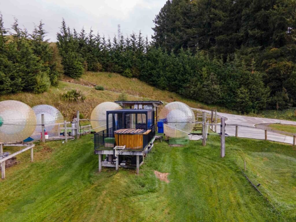 ZORB ball experience at Rotorua with water inside the inflatable globe on the hydro track